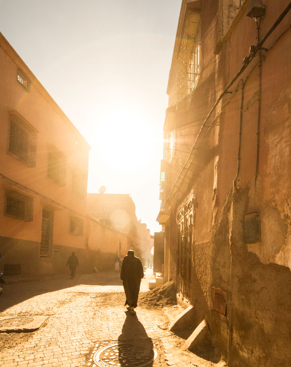 Man walking through the streets of Marrakech, Morocco
