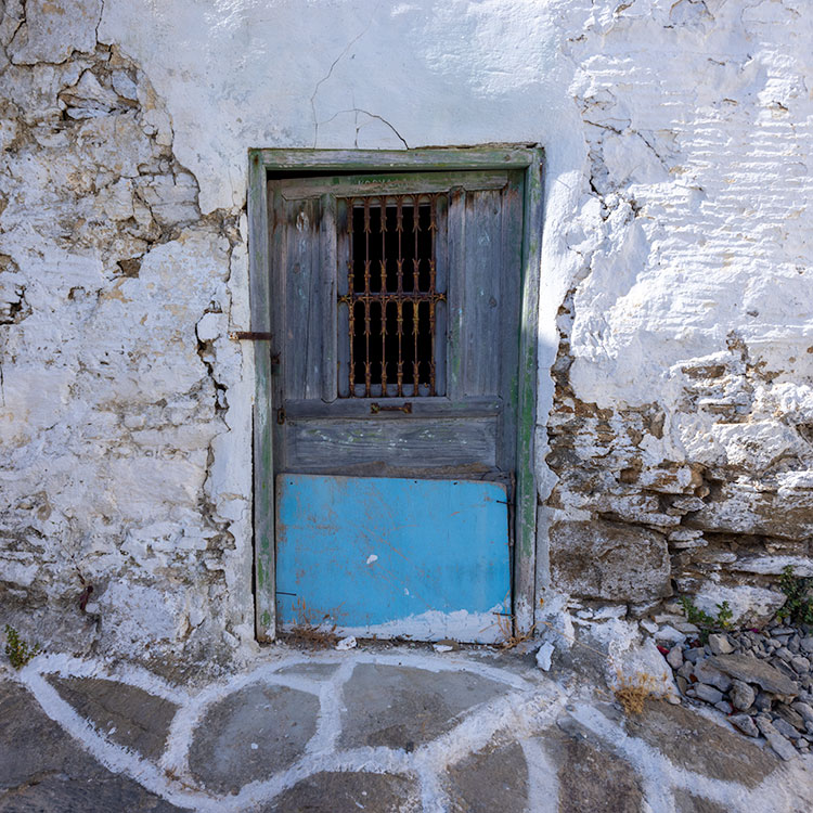 Tiny door in Lefkes, Greece