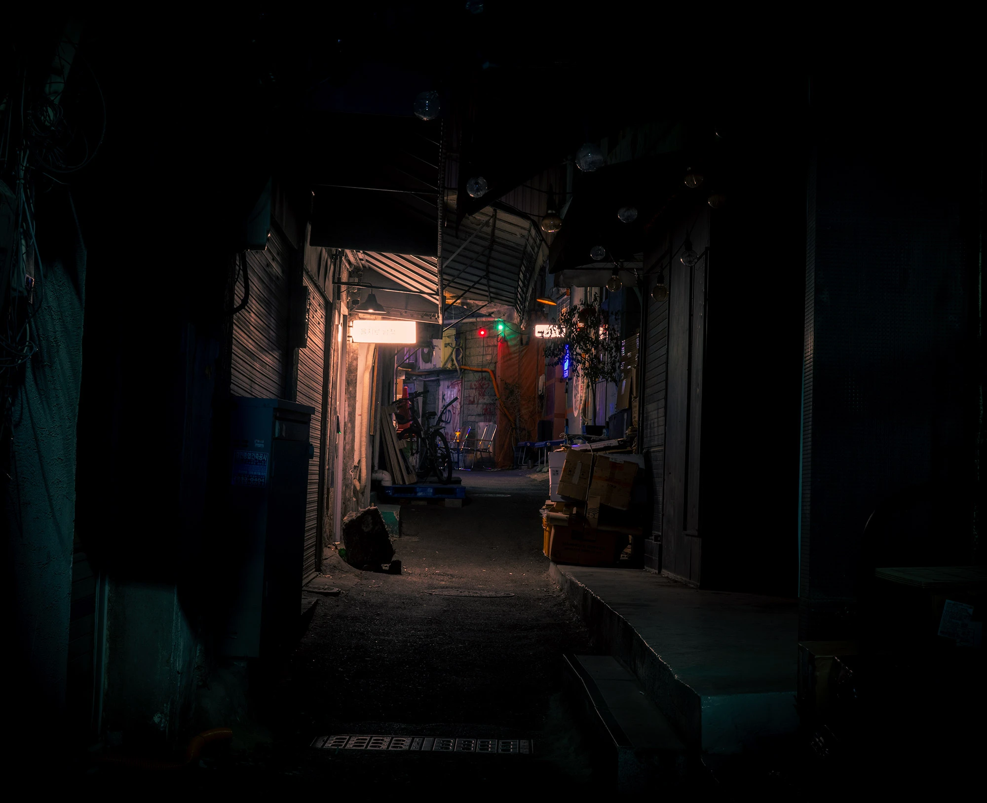 Euljiro lights at night in a dim alley.